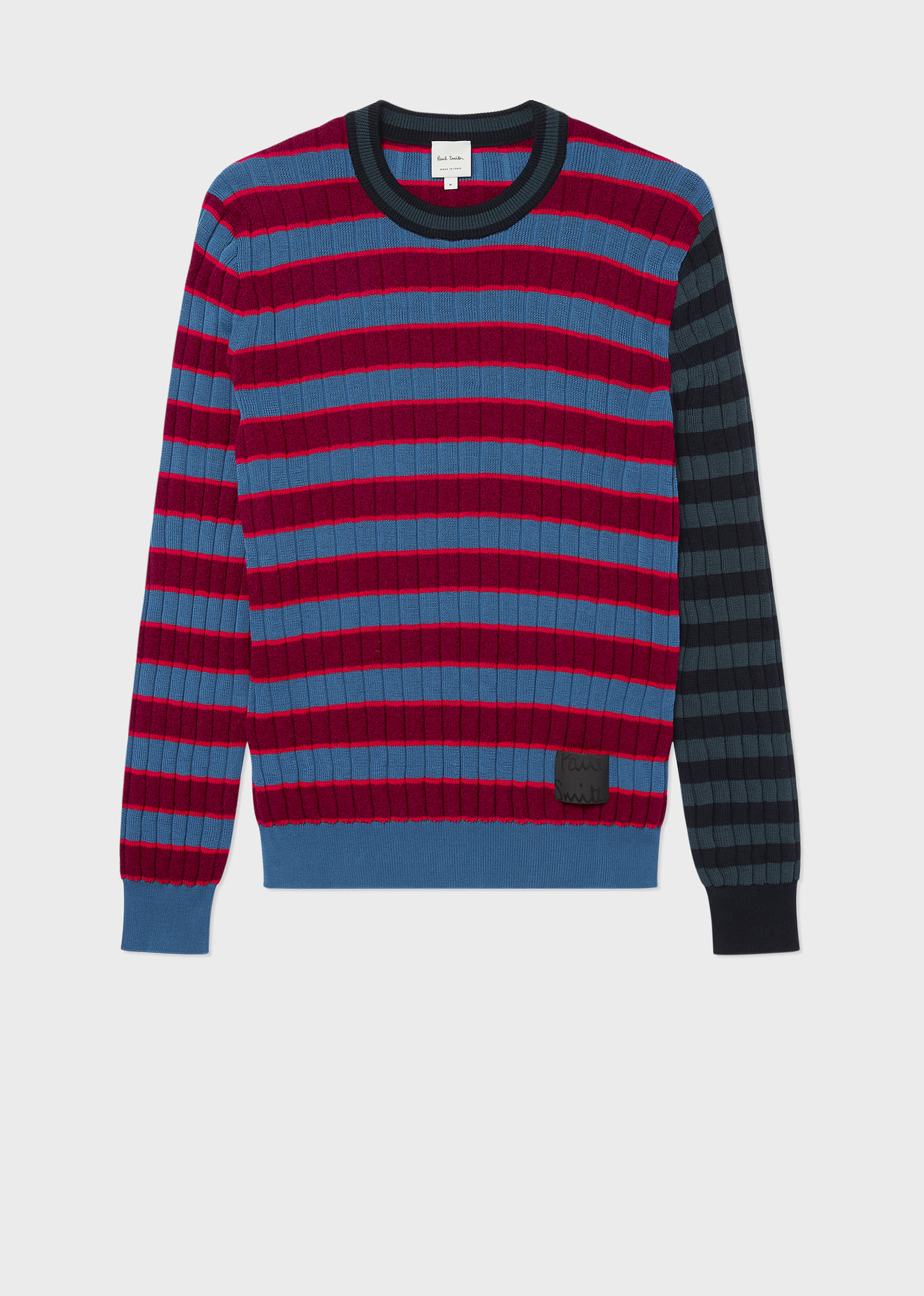 white sweater with red and blue stripes