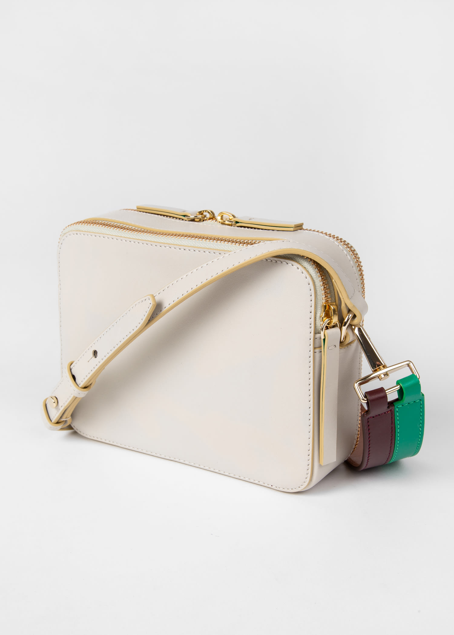 beige designer clutch