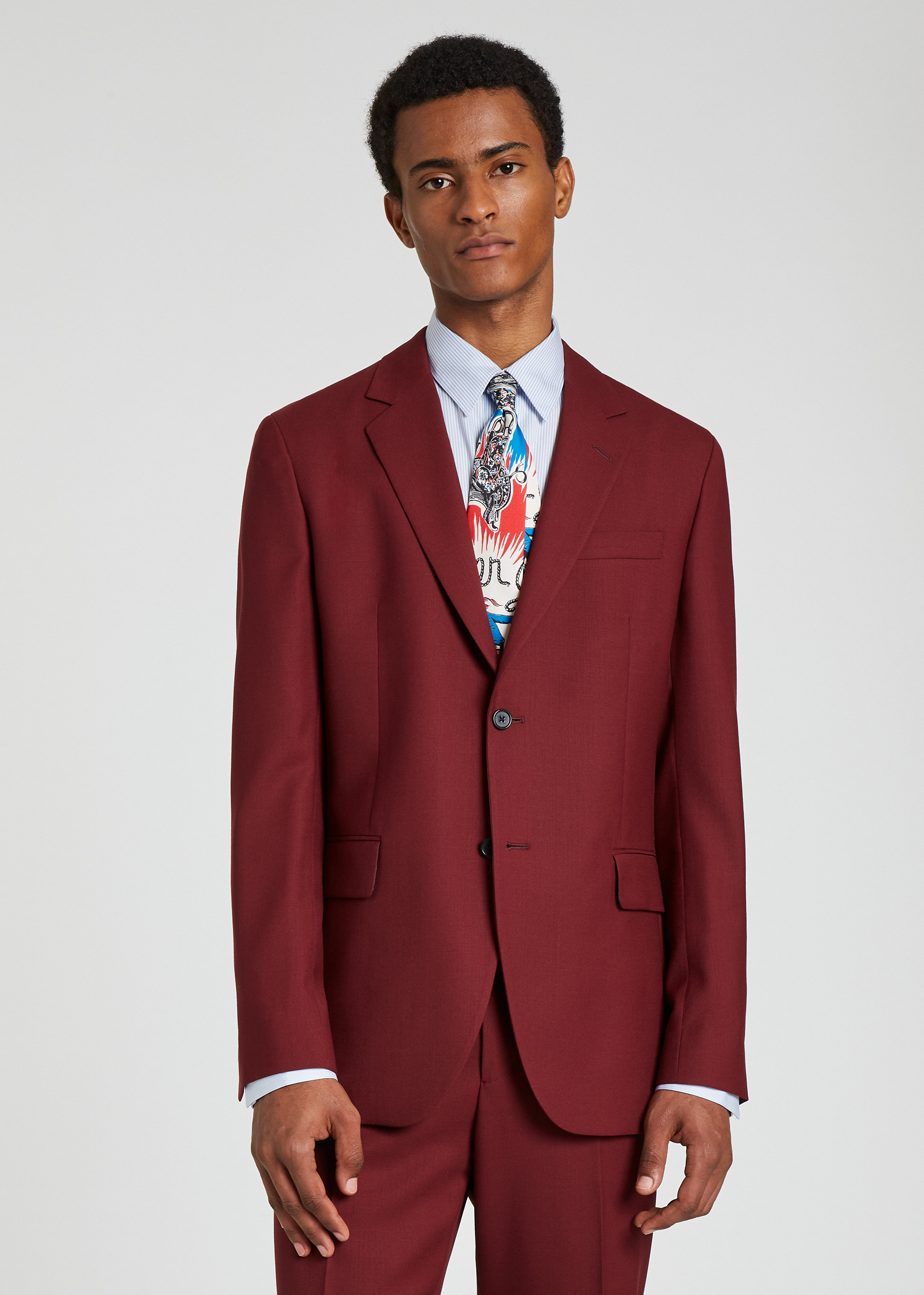 Model front view - A Suit To Travel In - Men's Cherry Red Wool Suit Paul Smith