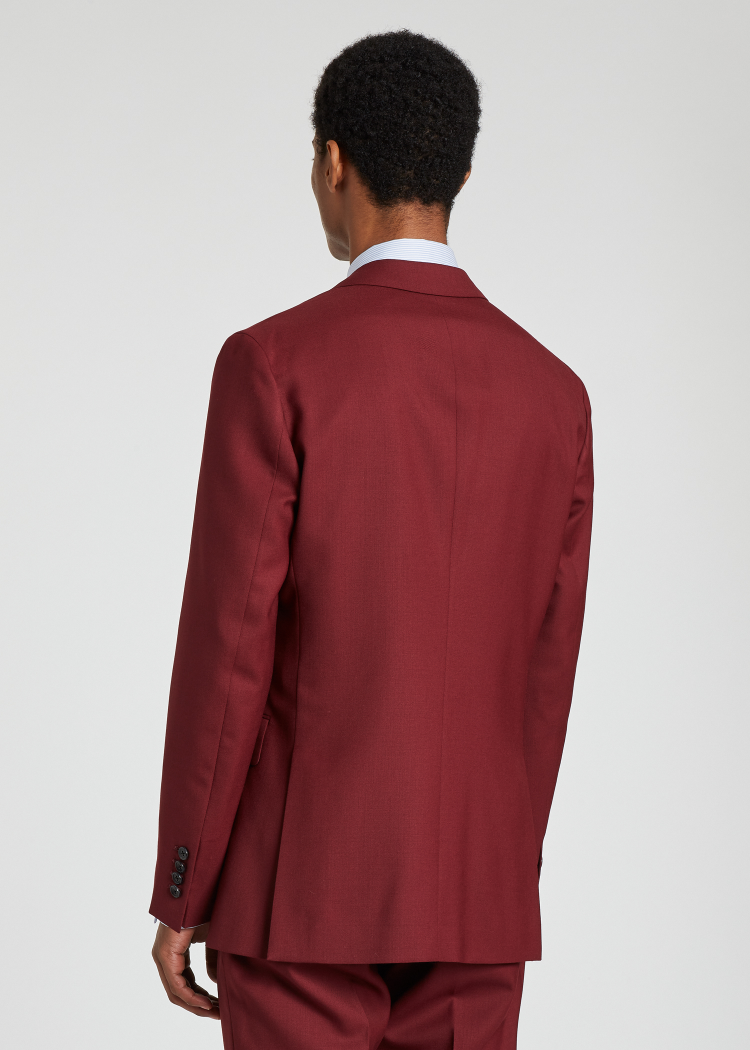 Model back view - A Suit To Travel In - Men's Cherry Red Wool Suit Paul Smith