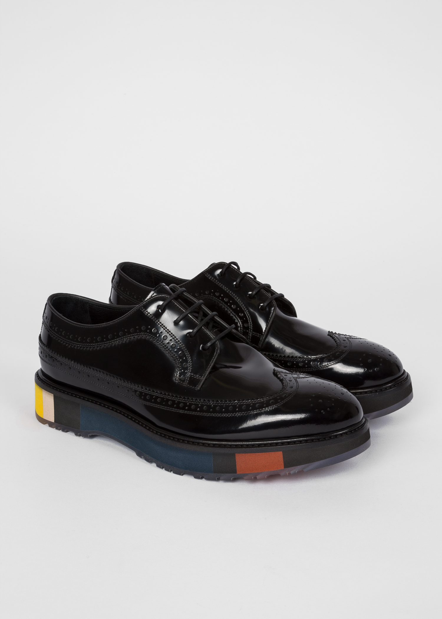 black brogues with brown soles
